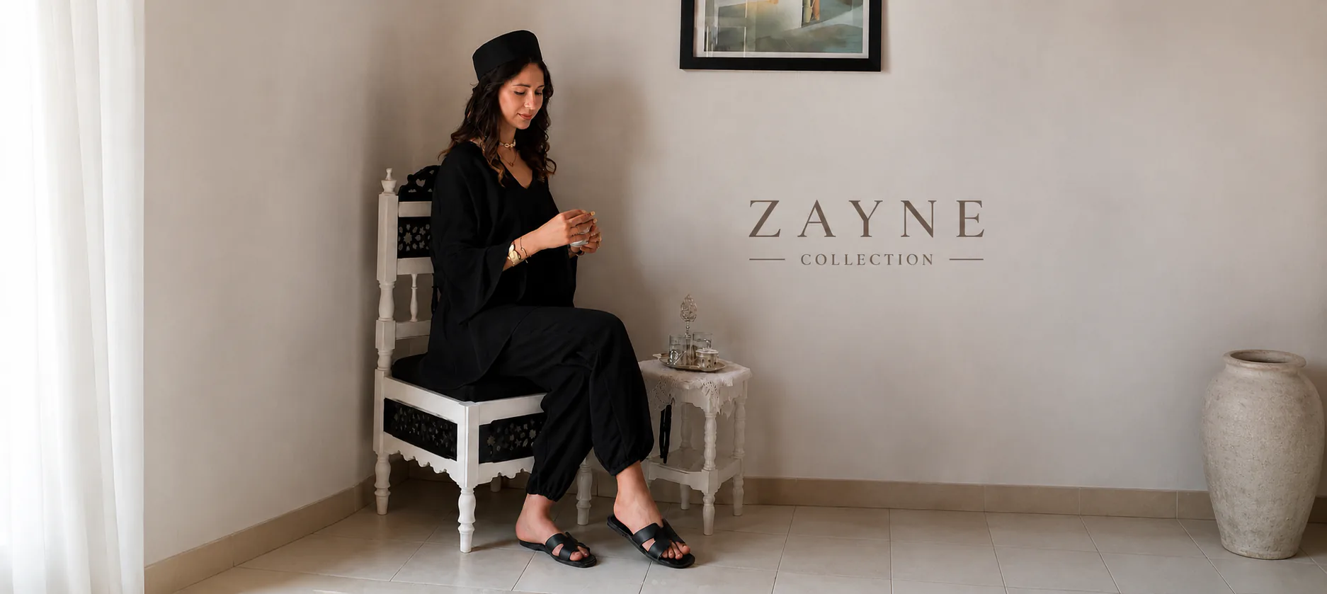 Woman wearing a relaxed black ZAYNE outfit